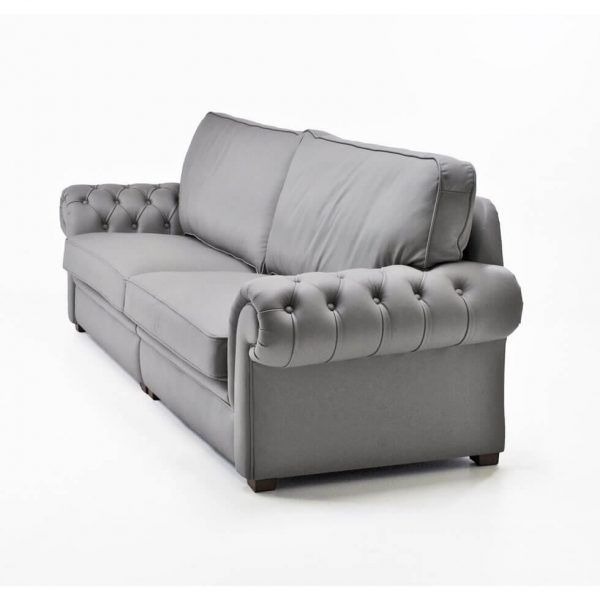 Detalle tapizado capitone brazo sofa marino salon clasico piel
