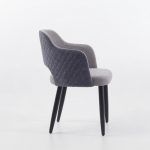 Silla moderna NORI tapizada con patas en madera y forma cónica