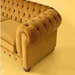 Detalle sofa cama o fijo CHESTE clasico capitone patas madera