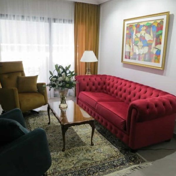 Ambiente sofa clasico tapizado capitone terciopelo