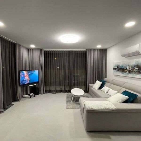Sofá chaiselongue moderno mesa centro ovalada Spool