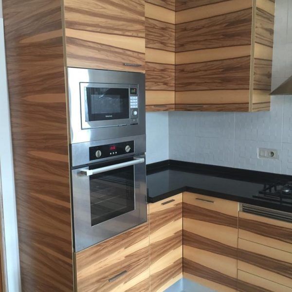 Detalle cocina moderna muebles a medida chapa raiz