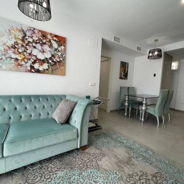 Ambiente sofa cama mesa Retto Glass y sillas Retto modernas